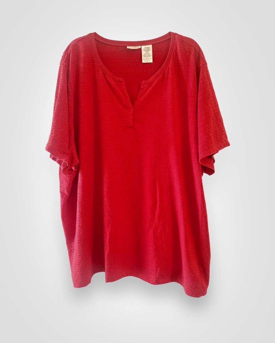 The same henley after Inky's studio polish — off the hanger, restaged, item unchanged